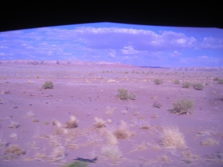 Miles and miles of barren desert terrain.
