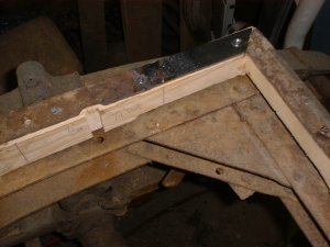 Steel rails at rear corner
