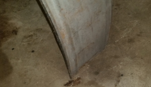 Nothing left of the part that attaches to the running board. 