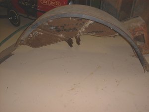 Outside of rear drivers side fender